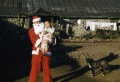 1953년 제주도 어느 마을의 크리스마스 행사의 산타로 분장한 사람과 어린이.jpg